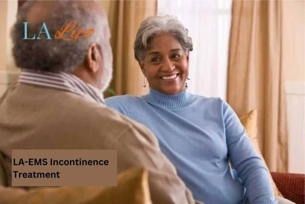 Couple sat smiling at each other - LA-EMS treatment Camberley