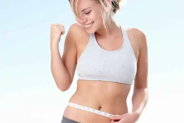 woman happy after fat reduction treatment Camberley