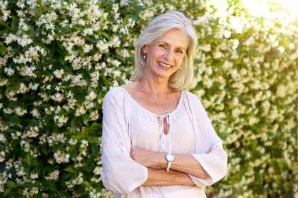 Older woman happy with urinary incontinence treatment Camberley
